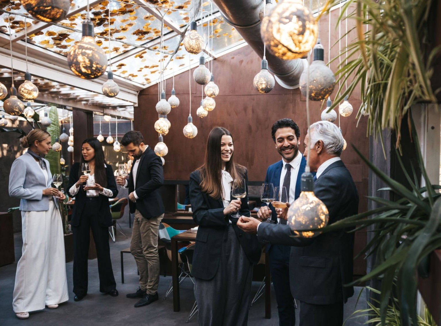 Event attendees discussing business in the lobby